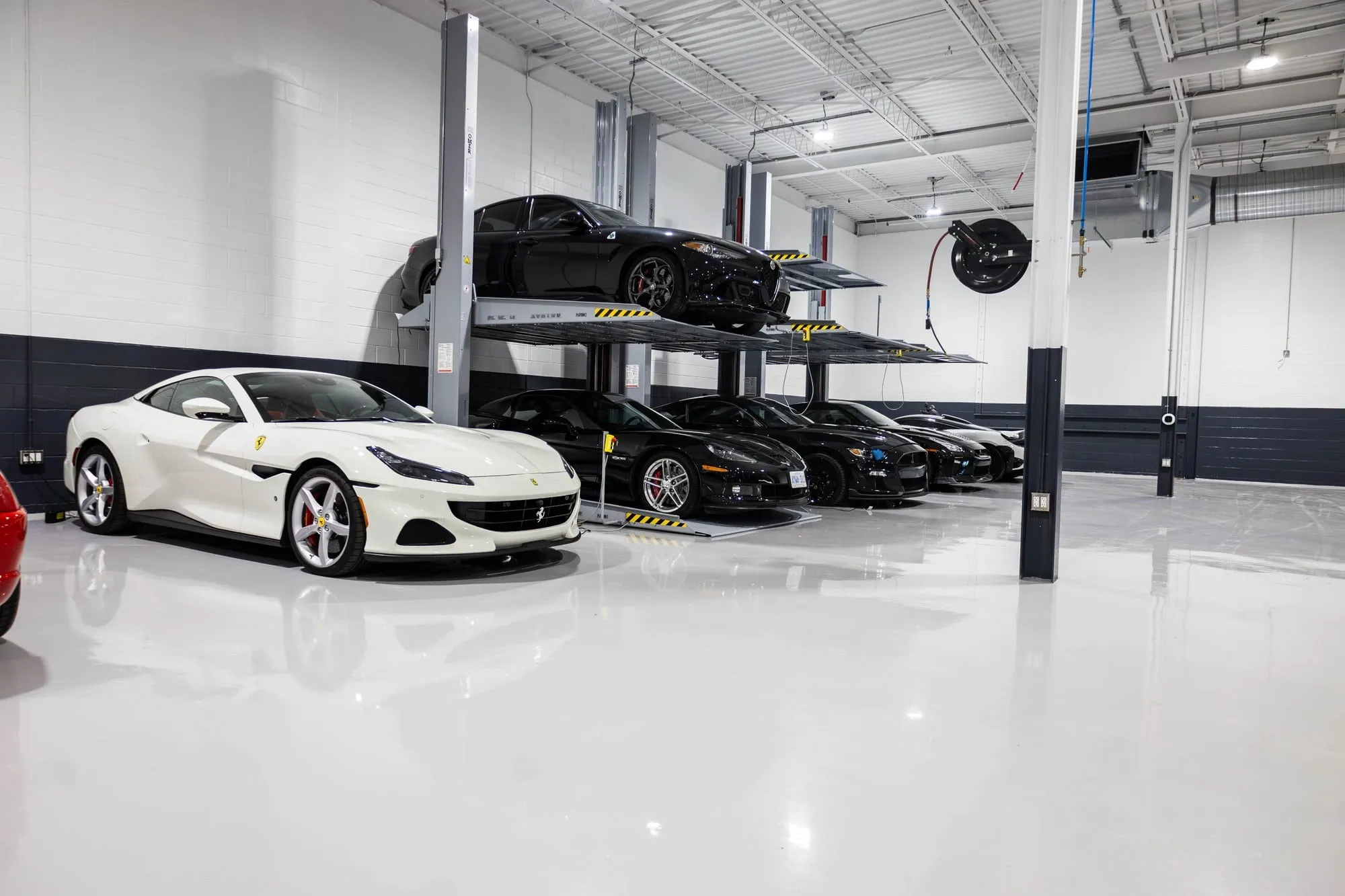 A white car parked in a garage