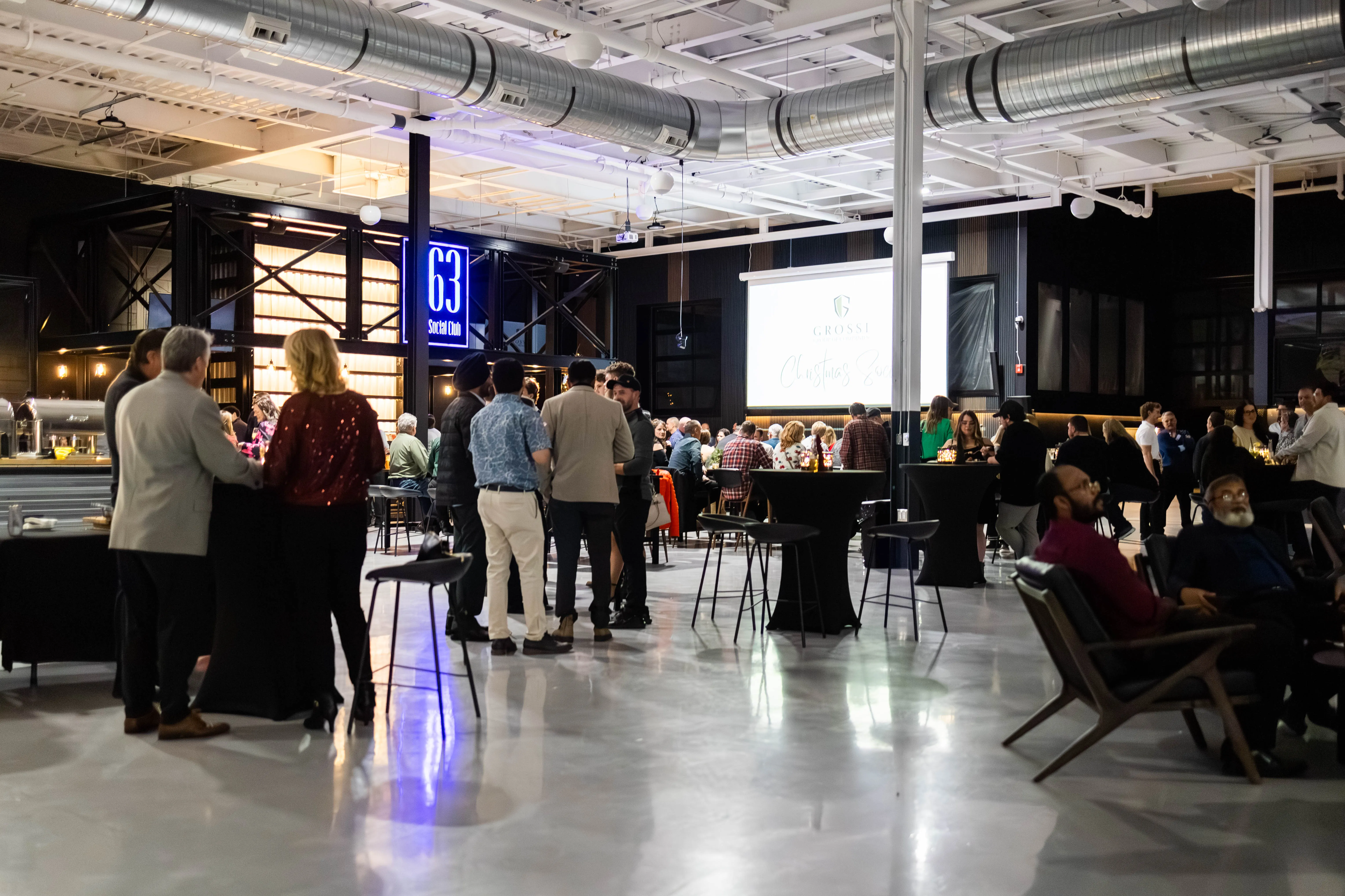 A black sports car parked in a garage